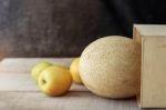 Melon On Wooden Stock Photo