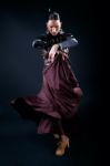 Young Flamenco Dancer In Beautiful Dress On Black Background Stock Photo