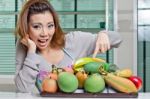 Woman Preparing Material Stock Photo