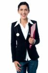 Young Lady Doctor Holding Clipboard Stock Photo