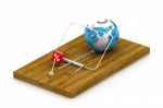 Globe In Mousetrap Stock Photo