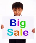 Small Boy Showing Big Sale Board Stock Photo