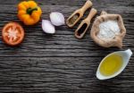 The Ingredients For Homemade Pizza On Shabby Wooden Background Stock Photo