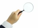 Magnifying Glass In Hand Stock Photo