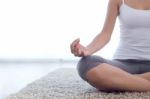 Beautiful Young Woman Doing Yoga Exercises At Home Stock Photo