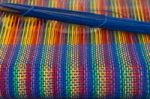 Comb Loom With Rainbow Colors And Diversity Flag Stock Photo