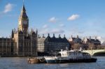 Working Boats In Front Of The Houses Of Parliament Stock Photo