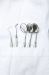 dental tools in dentist pocket Stock Photo