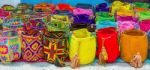 Street Vendor Selling Craft Bags In Cartagena, Colombia Stock Photo