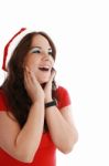 Surprised Lady With Santa Hat Stock Photo