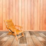 Wooden Deck Chair In Retro Style On Wooden Floor Interior Stock Photo