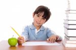 School Boy Doing His Homework Stock Photo