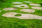 Concrete Parking Fied Mixed With Grasses Stock Photo