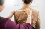 Fashion Designer Measuring On Body Part Of Women For A Tailor Ma Stock Photo