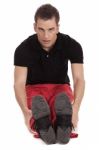 Fitness Man Streching Leg Stock Photo