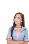 Thoughtful And Worried Woman Looking Up, Isolated Over A White B Stock Photo