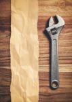 Wrench On Wooden Background Stock Photo