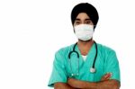 Young Male Doctor With Face Mask Stock Photo