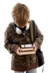 Boy Looking Books With Headphone Stock Photo