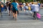 Blurry People Walking In The Street Stock Photo