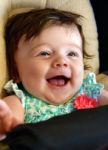 Very Happy Infant In Carseat Stock Photo