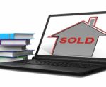 Sold House Laptop Shows Sale And Purchase Of Property Stock Photo