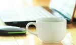 Coffee With White Notebook Stock Photo