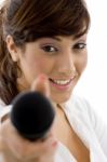 smiling Woman Showing Microphone Stock Photo