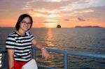 Women Tourist Cruising At Sunset Stock Photo