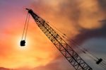 Construction Crane On Evening Background Stock Photo