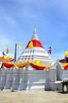White Pagoda Against Blue Sky At Wat Poramaiyikawas Temple In No Stock Photo