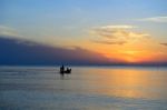 Fisherman Fishing Boat On Sea Stock Photo