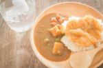 Curry Rice With Fried Pork Stock Photo