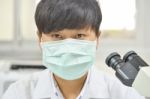 Scientist With Equipment And Science Experiments Stock Photo