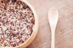 Organic Dry Multi Grain Rice In Wooden Bowl Stock Photo