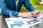 Handsome Businessman Wearing Suit And Using Modern Laptop Outdoo Stock Photo