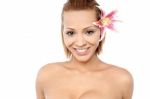 Attractive Woman With Pink Lily Flower Stock Photo