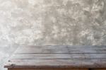 Old Wood Table With Vintage Loft Cement Background Stock Photo