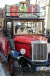 Old Fashioned Red Bus In Rothenburg Stock Photo