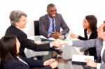 Multi Ethnic Team During Meeting Stock Photo