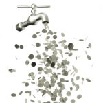 Dripping Tap With Silver Coins. Welth Concept Stock Photo