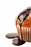 Muffin With Liquid Chocolate Stock Photo