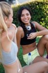 Group Of Young Women Doing Stretching In The Park Stock Photo