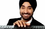 Businessman Typing On Keyboard Stock Photo