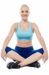 Athletic Woman Sitting And Resting Stock Photo