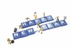 Miniature Worker Team Building Word Happy New Year On White Back Stock Photo