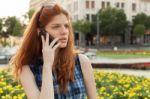 Woman Talking On The Phone Stock Photo