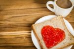 Delicious Slice Of Bread With Strawberry Jam Heart Shape Stock Photo