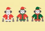 Monkey In Christmas Costumes Stock Photo