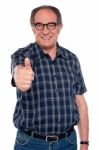 Aged Man Gesturing Thumbs Up Stock Photo